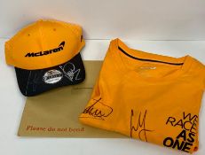 FORMULA ONE: Mclaren F1 memorabilia 2020 Signed caps and t-shirt by Lando Norris and Carlos Sainz