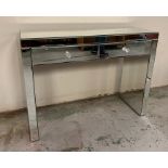 A mirrored console table (H76cm W100cm D36cm)