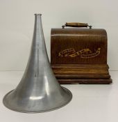 An Edison Gem phonograph in oak case with aluminium horn