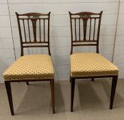 A pair of Victorian dining chairs with string inlay