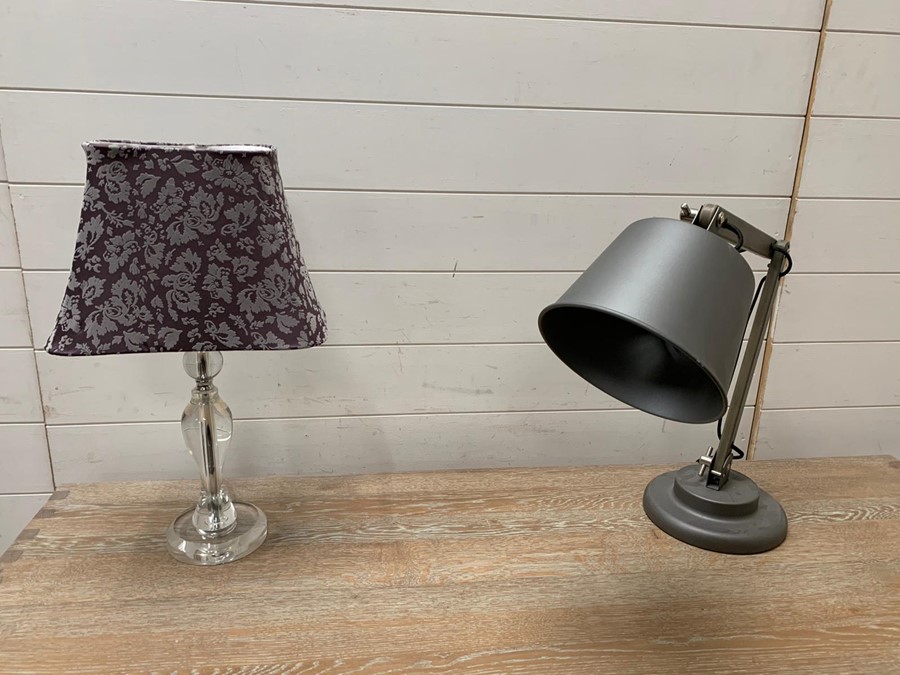A contemporary angle pose lamp and Perspex table lamp
