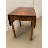 A Pembroke side table with drawers to centre (H75cm W68cm D52cm)