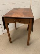 A Pembroke side table with drawers to centre (H75cm W68cm D52cm)