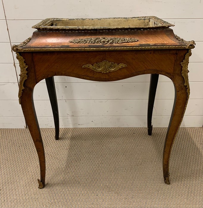 A satinwood ormolu mounted table AF (H77cm W65cm D42cm)