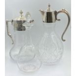 A Selection of three decanters to include two claret jugs and an etched decanter