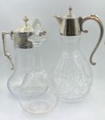 A Selection of three decanters to include two claret jugs and an etched decanter