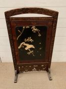 A mahogany fire screen with a bird on cherry tree to front (50cm x 85cm)