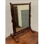 A mahogany toilet mirror