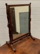 A mahogany toilet mirror