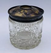 A cut glass silver and tortoiseshell hair tidy.