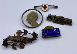 A small selection of various pin badges