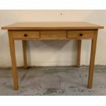 A pine desk with two drawers to centre (H75cm W100cm D60cm)