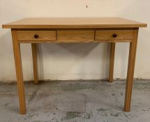 A pine desk with two drawers to centre (H75cm W100cm D60cm)