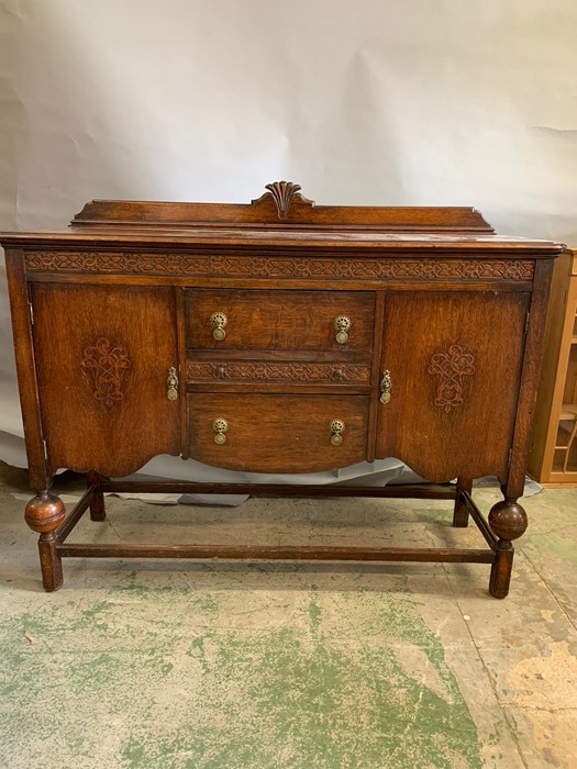 A mahogany sideboard with carved details to doors (H110cm W137cm D48cm) - Image 2 of 4