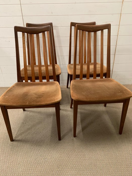 Four high back teak G-Plan chairs