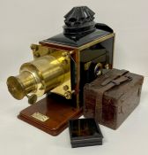 H Luscombe Toms magic lantern along with slides.