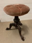 A mahogany stool on a barley twist column and down swept cabriole legs (H73cm Dia48cm)