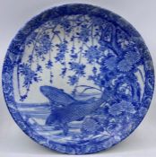 A Blue and White Koi Carp themed charger