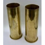 Two WWI brass shell cases.