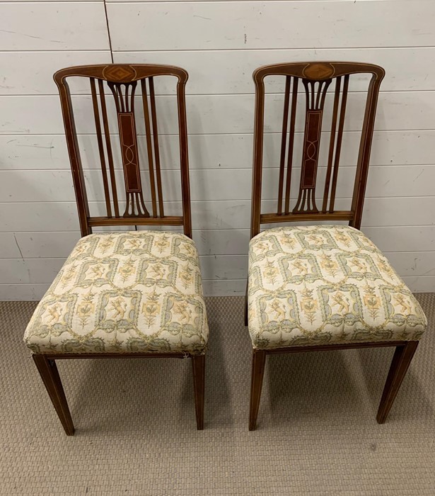 A pair of satinwood string inlay chairs