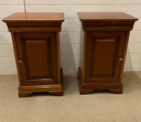 A pair of mahogany bedsides (H67cm W42cm D33cm)