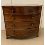 A bow front chest of drawers, two over three long (H108cm W108cm D56cm)