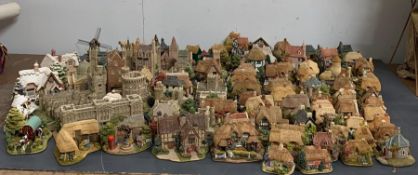 An extensive collection of 94 Lilliput Lane cottages and sculptures to include title deeds,