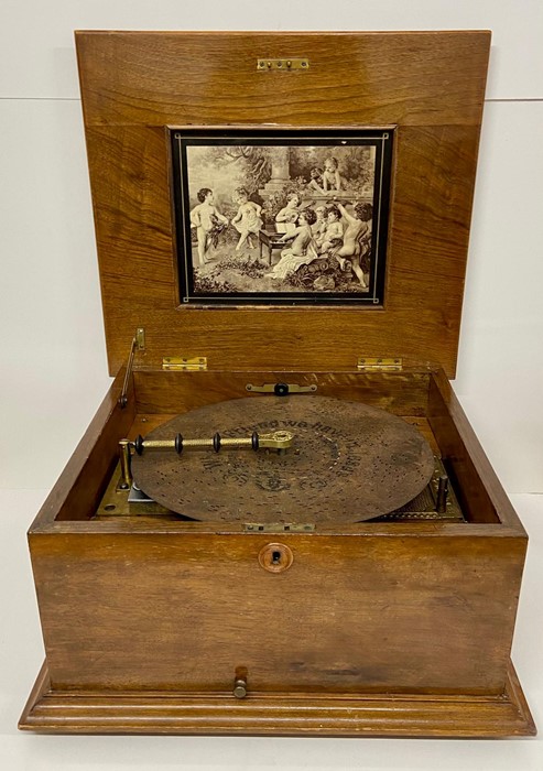 A Polyphon table top musical box, with a selection of Polyphon discs