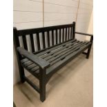 A wooden garden three seater bench (H82cm W160cm D55cm)