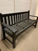 A wooden garden three seater bench (H82cm W160cm D55cm)