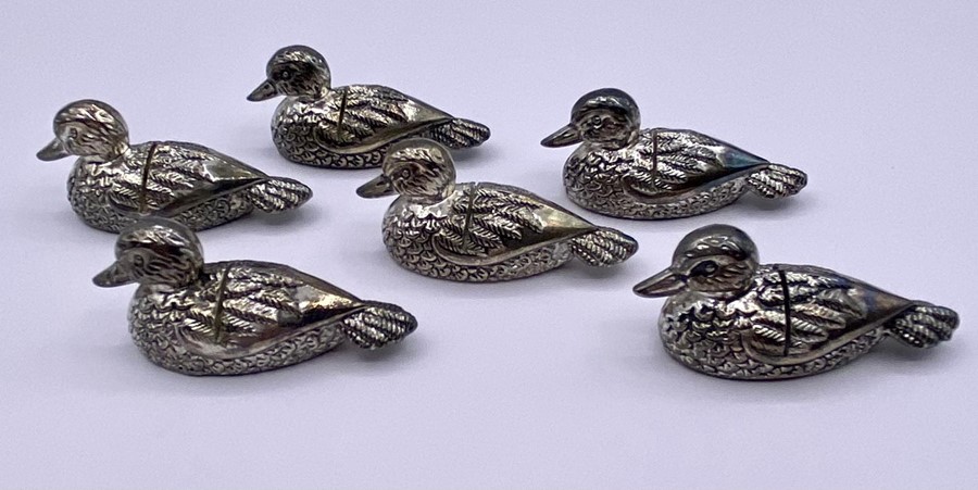 A set of six Silea name holders in the shape of ducks