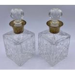 A Pair of Mappin & Webb silver collared liqueur decanters, hallmarked 1984