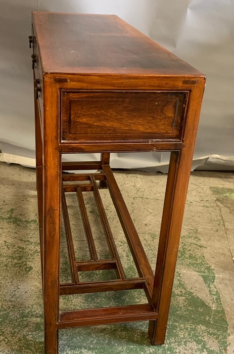 An oriental style hard wood console table with three drawers to centre and shelf (H80cm W100cm - Image 4 of 4