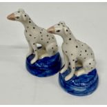 A Pair of Staffordshire Dalmatian figures
