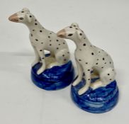 A Pair of Staffordshire Dalmatian figures