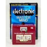Three Vintage electronic games to include: Nintendo Game & Watch Mario Bros with original box and