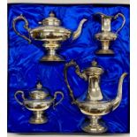 A Boxed Cavalier silver plated, hand chased tea service