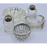 A selection of glass salts, various styles and one with a silver hallmarked rim.