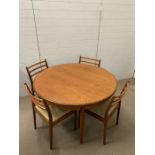 A G-Plan extendable table and four chairs