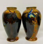 A Pair of Art Nouveau vases with peacock decoration