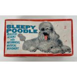 A vintage Alps Sleepy Poodle toy, realistic actions with mechanical musical movement