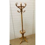A pine coat stand comprising of six arms