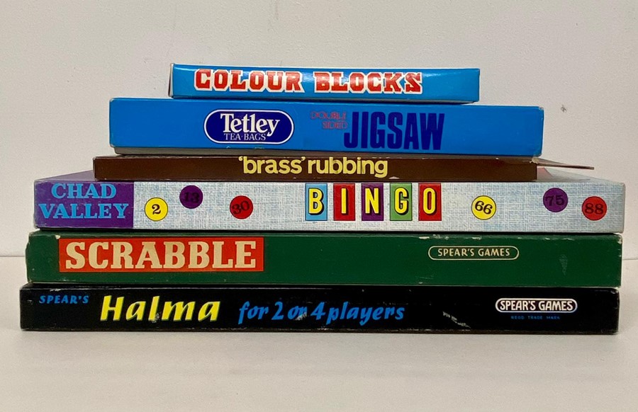 A selection of six boxed puzzles and games to include, Colour Blocks, Bingo, Scrabble, Brass