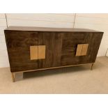 A contemporary sideboard on brushed brass legs and handles by Mercury Row (H76cm W148cm D44cm)