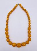 A graduated amber style necklace