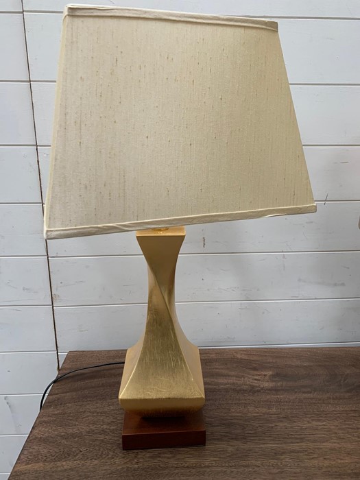 A pair of contemporary table lamps with twisted centre on wooden base and cream shades - Image 2 of 4