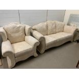 A three seater cream sofa and one armchair (H92cm W200cm D84cm sofa)