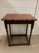 A mahogany side table on barley twist legs (H63cm W54cm D37cm)