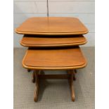 A Nest of three Mid Century tables