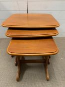 A Nest of three Mid Century tables